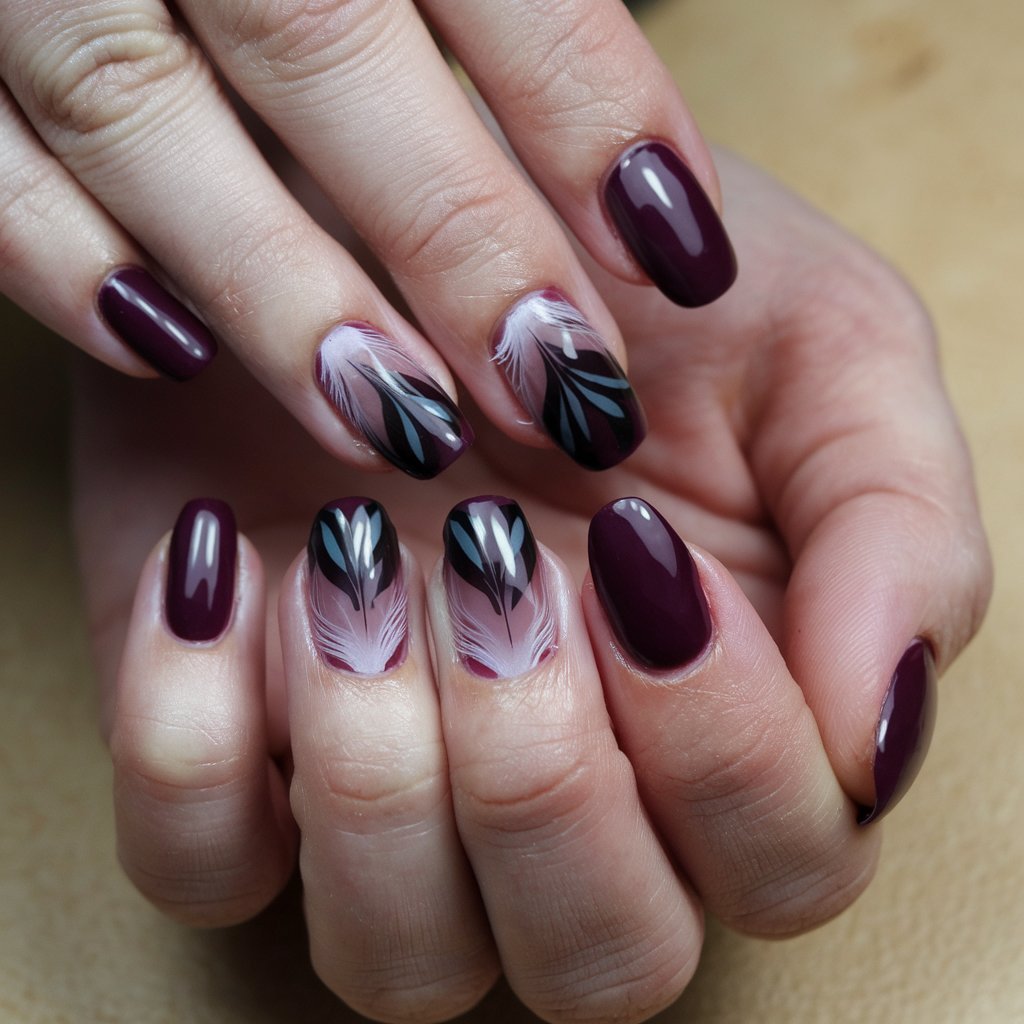 Dark Plum Nails with Feather Accents